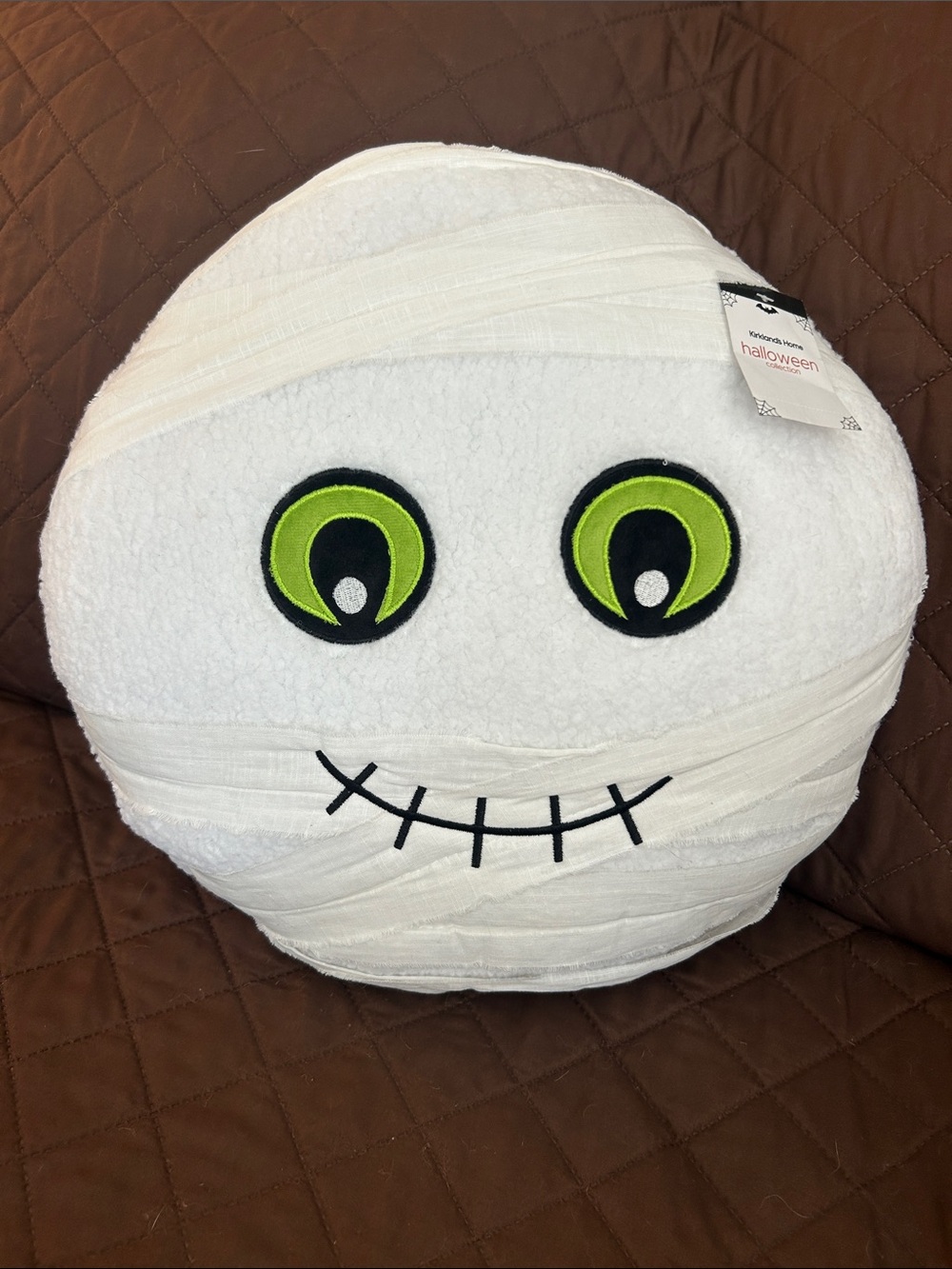 Kirklands White Mummy Plush Pillow with Lime Green Eyes